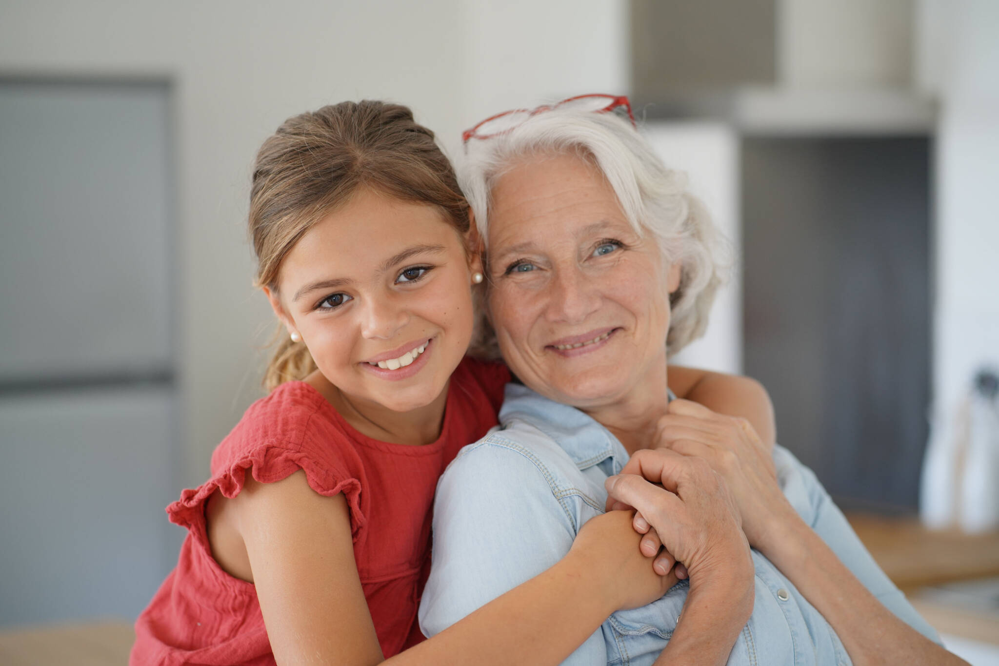 Portrait Of Smiling Grandmother With Grandkid